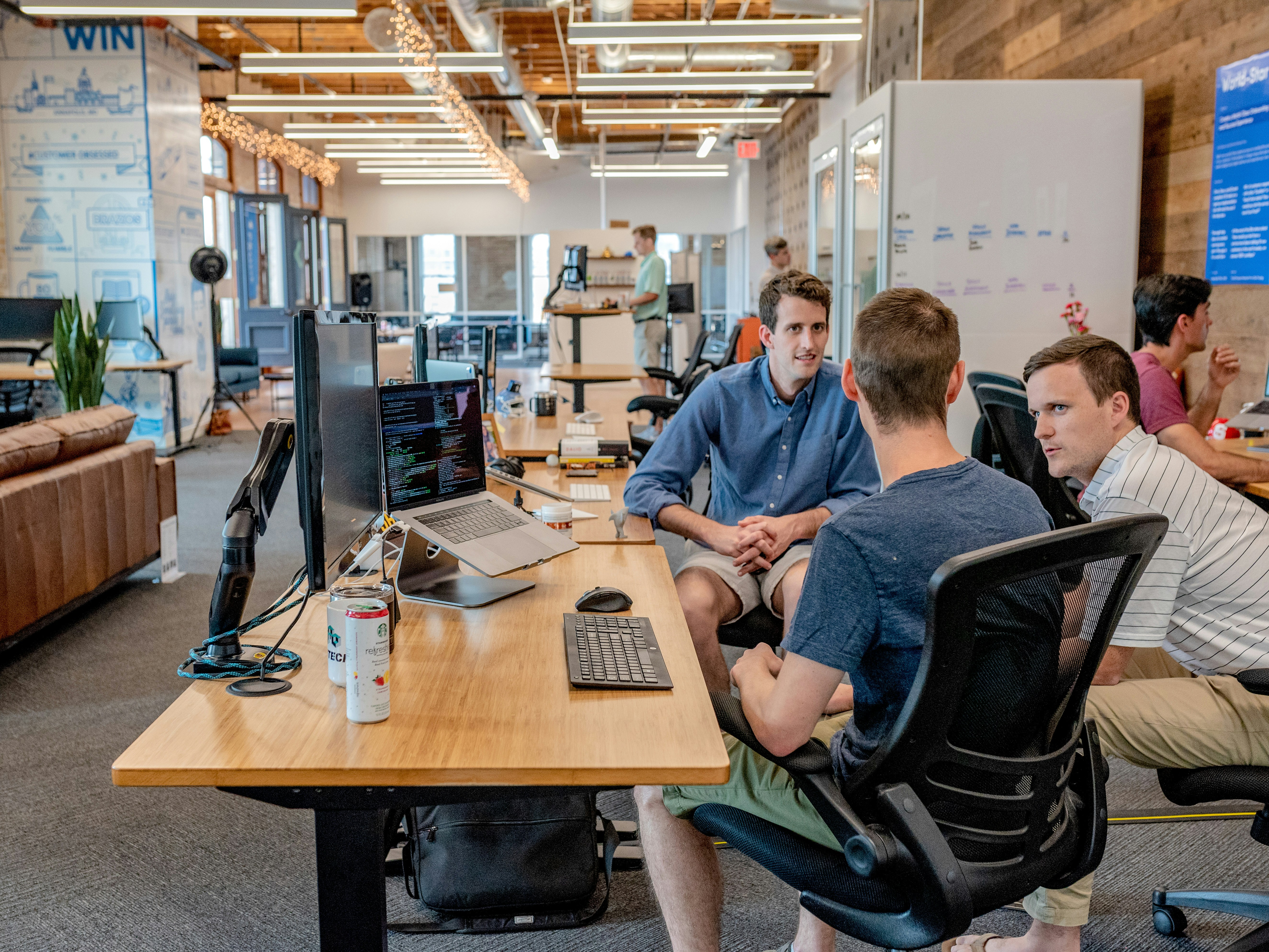Happy business team using technology